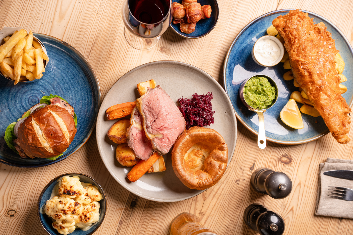 Family enjoy Father's Day roast dinner at the White Hart in Overton